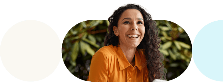 woman smiling in Optum colors