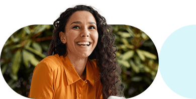 woman smiling in Optum colors